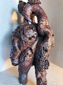 Statut en bois homme sur bête en bois sculpté