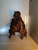 Statut en bois homme sur bête en bois sculpté