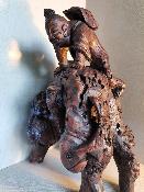 Statut en bois homme sur bête en bois sculpté